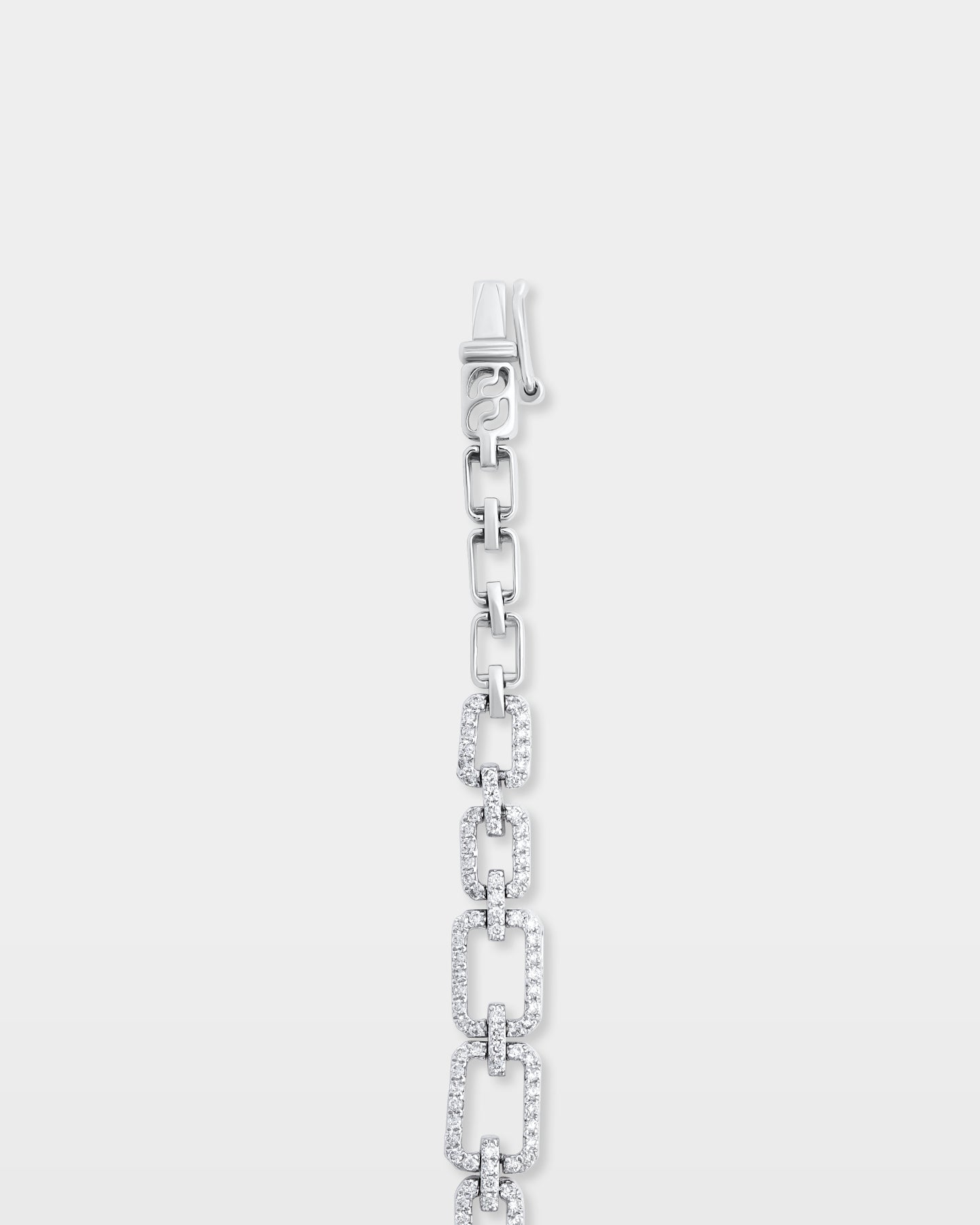 A top-down view of a 1.91ct rectangular diamond link bracelet showing the openwork geometric design and integrated box clasp closure
