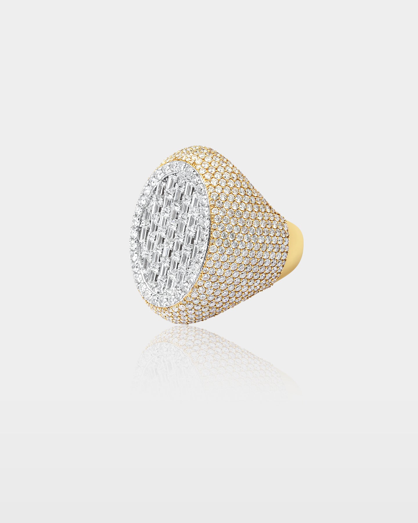 Two-Tone Oval Emerald and Round Diamond Cluster Ring | The Ice Champ Grapevine, Texas