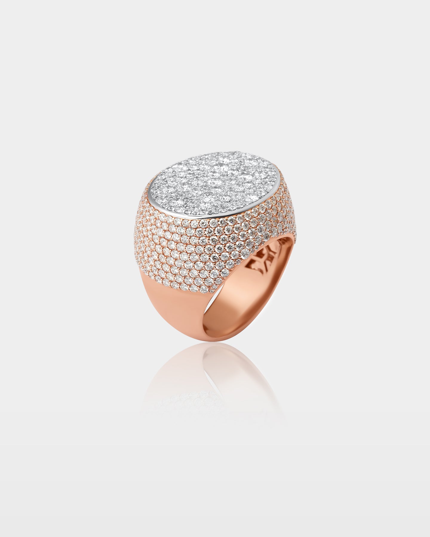 White and Rose Gold Oval Face Pavé Diamond Ring | The Ice Champ Grapevine, Texas