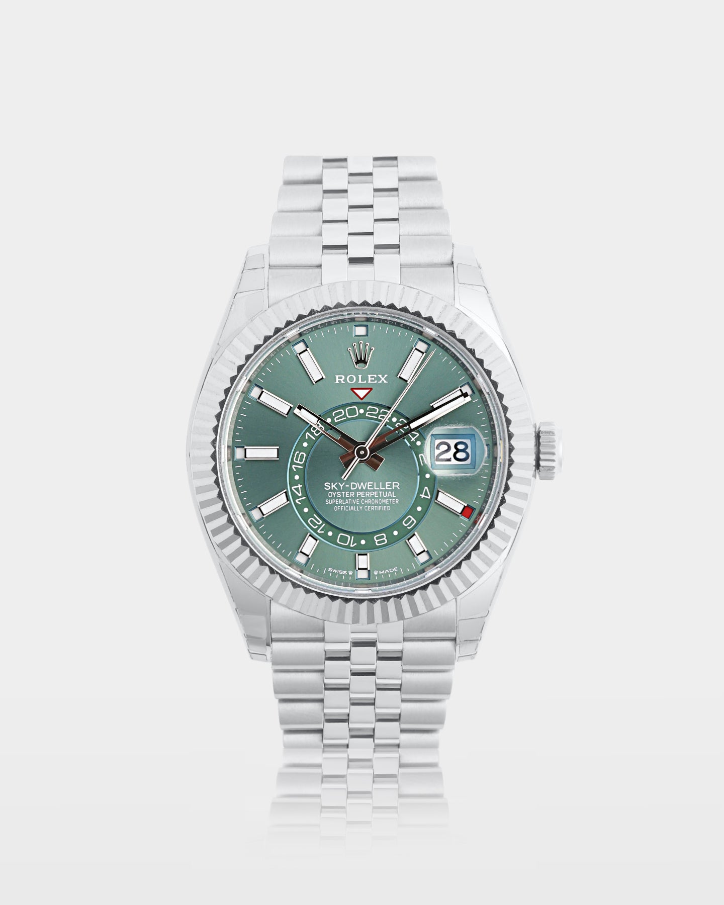 Rolex Sky-Dweller 42mm watch featuring a sunray mint green dial, 18k white gold fluted Ring Command bezel and a steel Jubilee bracelet